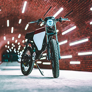 Picture of motorbike parked in brick tunnel